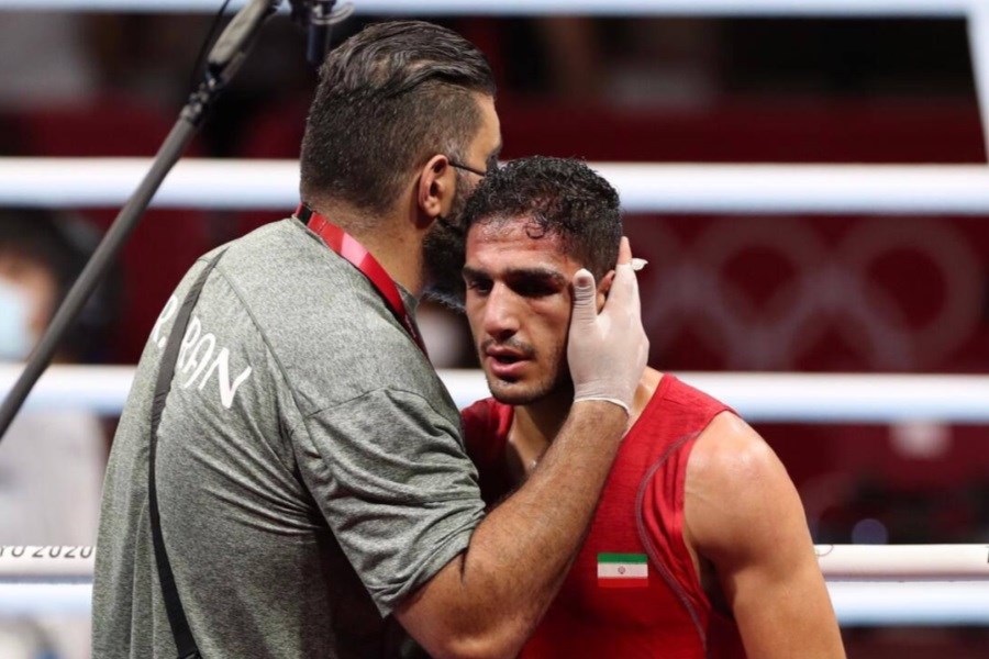 تصویر شکست بوکسور ایرانی مقابل نماینده میزبان المپیک