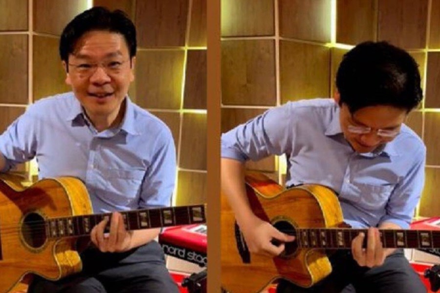 تصویر هنرنمایی معاون نخست وزیر سنگاپور با گیتار